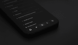Close-up of a smartphone showing the Linear app interface, with a blurred list of projects and navigation icons along the bottom.